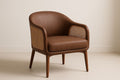Brown faux leather armchair with rattan armrests and cushions
