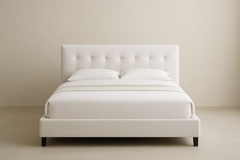 Beige upholstered double bed